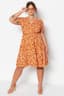 Trendyolmilla Curve Turuncu Skater V Yaka Çiçek Desenli Örme Büyük Beden Elbise TBBSS22EL1638